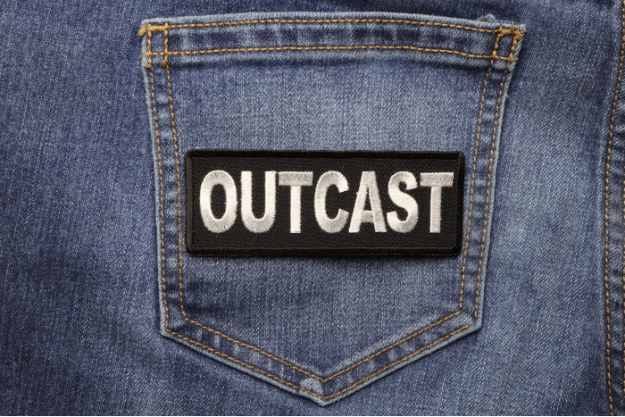 Outcast Patch shown on jeans