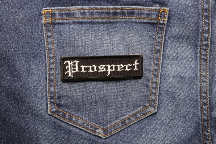 Prospect Patch In Old English shown on jeans