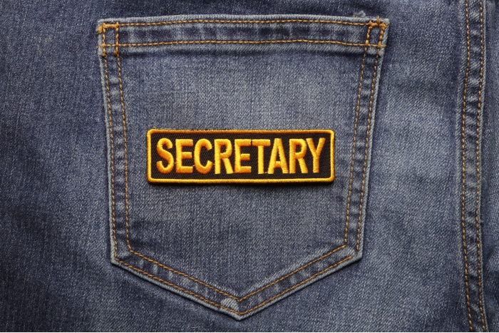Secretary Patch shown on jeans