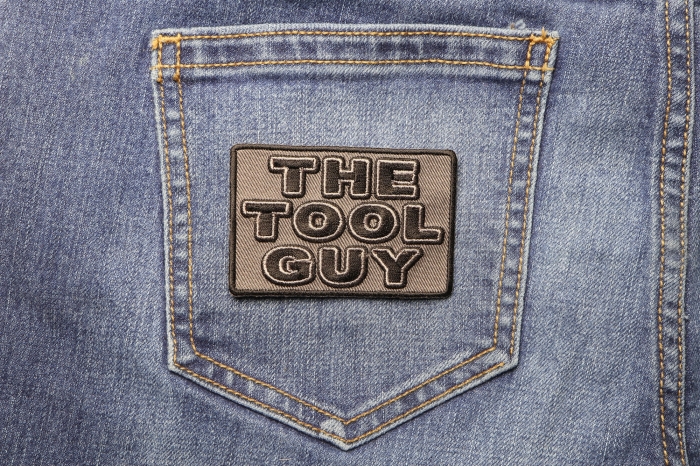 The Tool Guy Patch shown on jeans