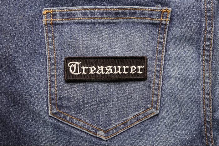 Treasurer Patch shown on jeans