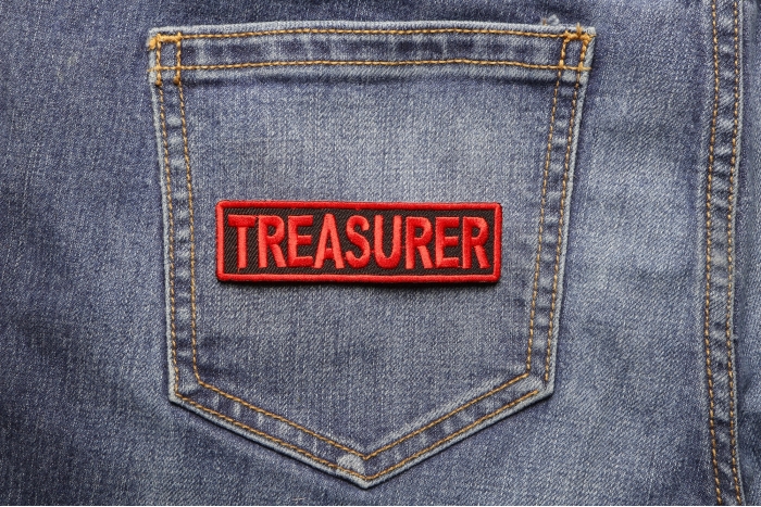 Treasurer Patch shown on jeans