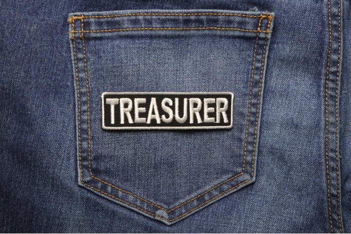 Treasurer Patch shown on jeans