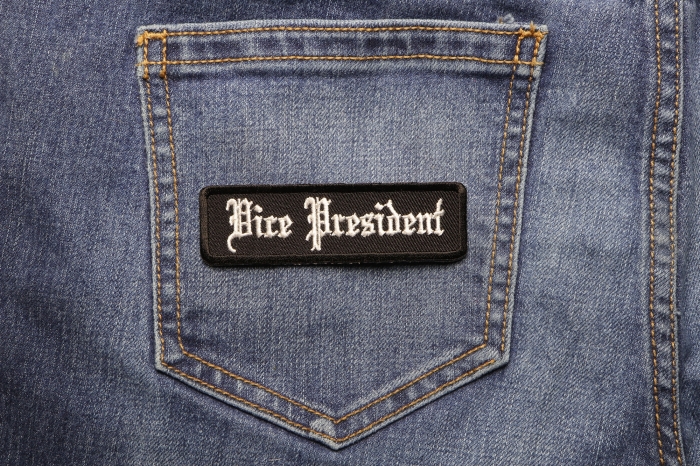 Vice President Patch In Old English shown on jeans