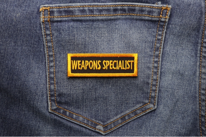 Weapons Specialist Patch shown on jeans