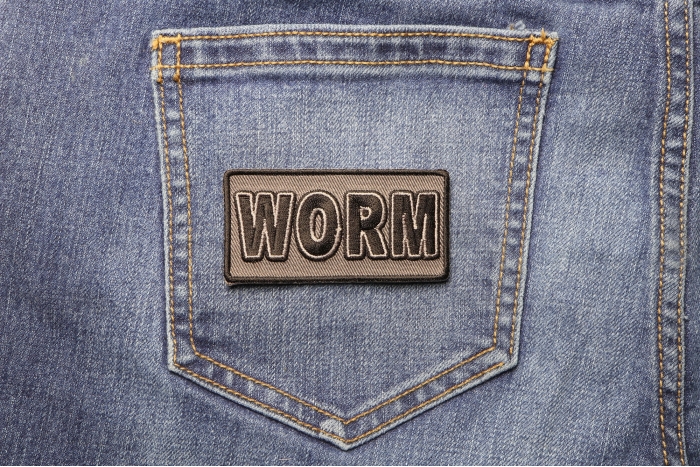 Worm Patch shown on jeans