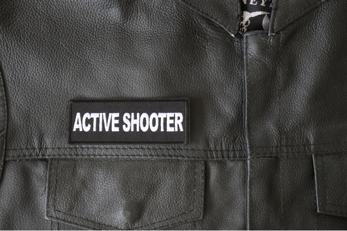 Active Shooter Patch - 4x1.5 inch - Embroidered Iron on Patch shown on leather vest