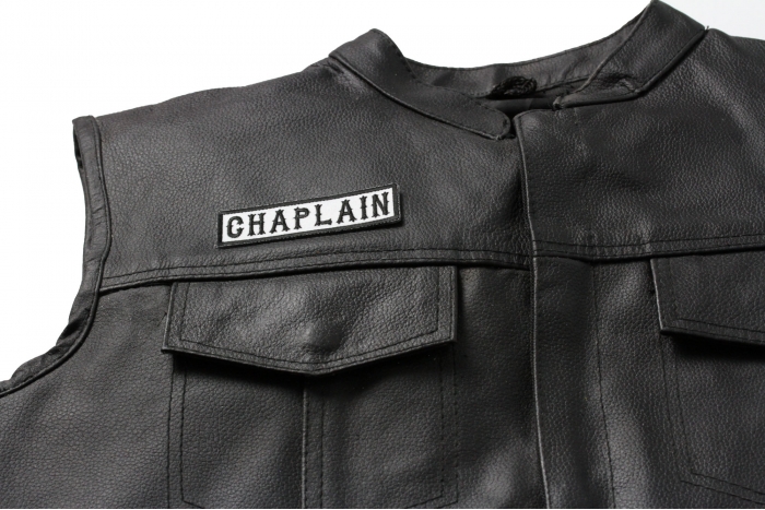 Chaplain Patch Black On White - Iron on Patch - 3.5x1 inch shown on leather vest