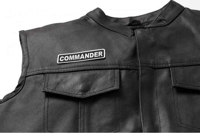 Commander Patch - 3.5x1 inch. Embroidered Iron on Patch shown on leather vest