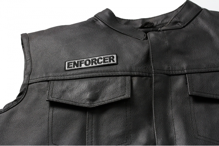 Enforcer Patch 3.5 Inch Reflective - 3.5x1 inch shown on leather vest