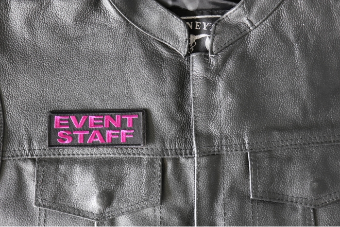 Even Staff Patch Pink - 4x1.5 inch - Embroidered Iron on Patch shown on leather vest
