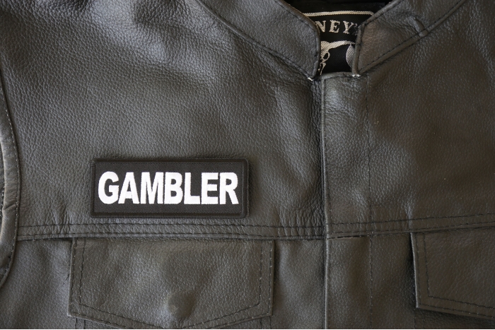 Gambler Patch - 4x1.5 inch - Embroidered Iron on Patch shown on leather vest
