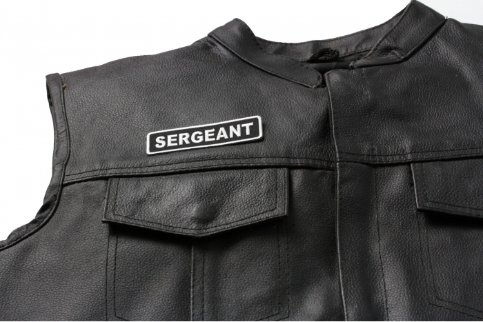 Sergeant Patch - 3.5x1 inch. Embroidered Iron on Patch shown on leather vest