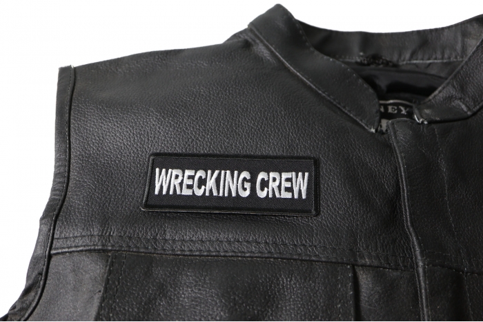 Wrecking Crew Patch - 4x1.5 inch shown on leather vest