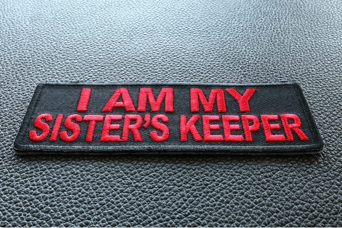 I Am My Sister's Keeper Patch In Red diagonal view