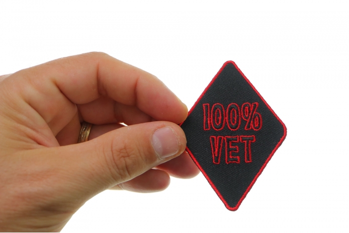 100 Percent Vet Patch shown on hand for size comparison
