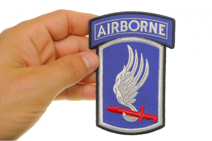 173rd Airborne Iron on Patch shown on hand for size comparison