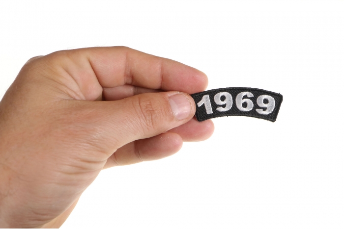 1969 Year Patch shown on hand for size comparison