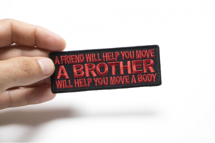 A Friend will Help you Move, A Brother Will Help You Move A Body Patch, Military Saying Patches shown on hand for size comparison