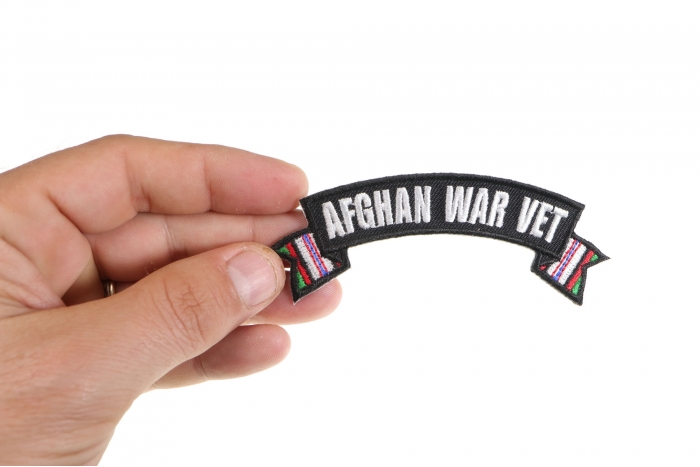 Afghan War Vet Small Ribbon Rocker shown on hand for size comparison
