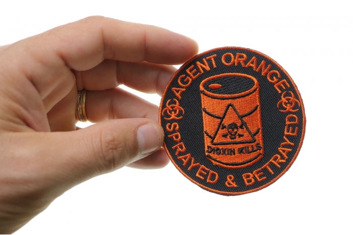 Agent Orange Sprayed and Betrayed Patch shown on hand for size comparison