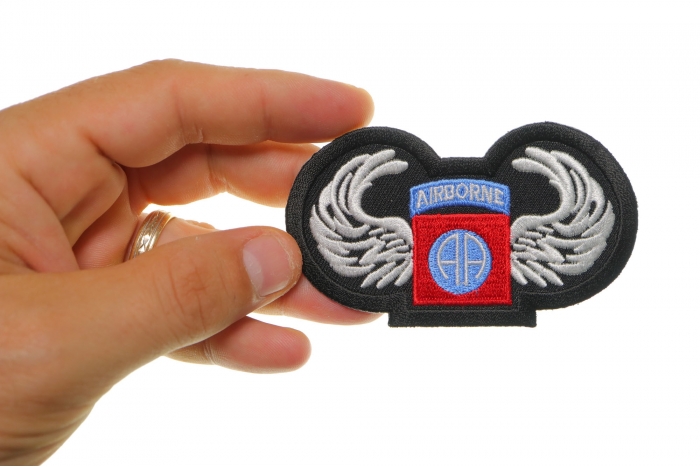 Airborne AA Patch shown on hand for size comparison