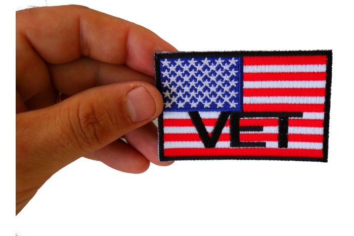 American Flag Vet Patch shown on hand for size comparison
