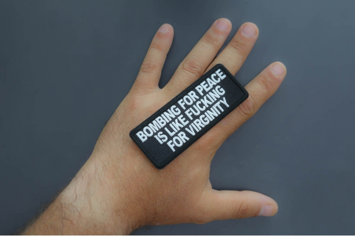 Bombing for Peace is like fucking for virginity Patch shown on hand for size comparison