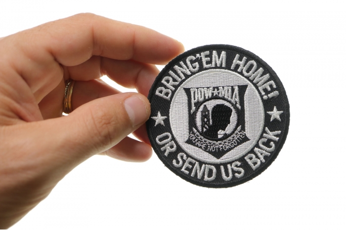 Bring Em Home or Send US Back Small Iron on Patch shown on hand for size comparison