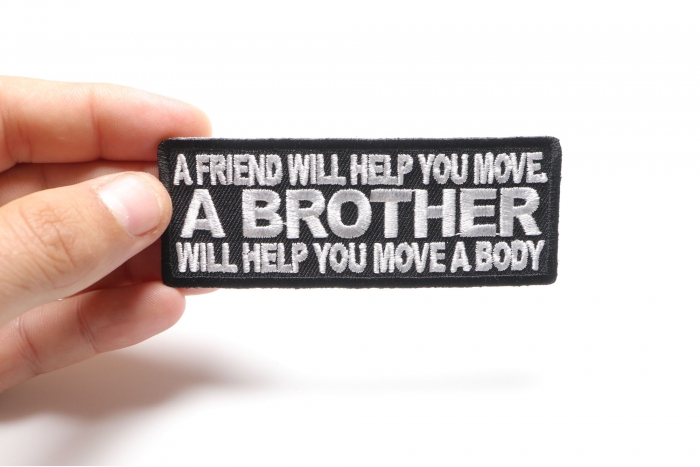 A Friend Will Help You Move A Brother Will Help You Move A Body Patch, Military Saying Patches shown on hand for size comparison