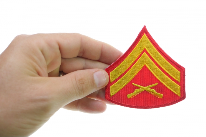Corporal Red Iron on Patch shown on hand for size comparison
