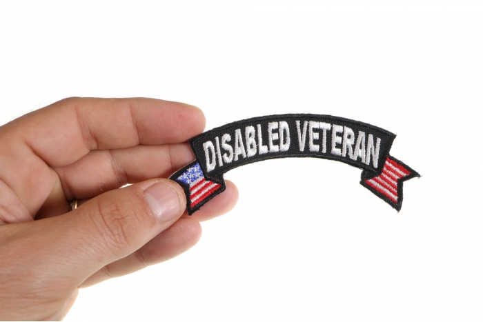 Disabled Veteran Patch with American Flag Tips, Military Vet Patches shown on hand for size comparison