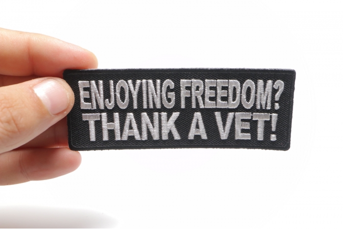 Enjoying Freedom Thank A Vet Patch, Military Saying Patches shown on hand for size comparison