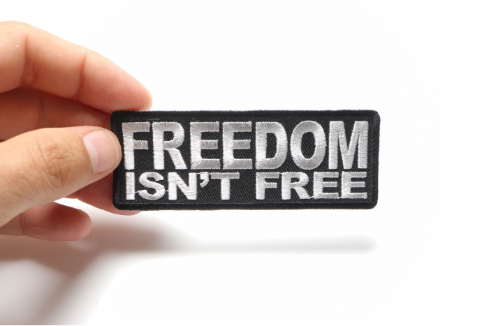 Freedom Isn't Free Patch, Patriotic Saying Patches shown on hand for size comparison