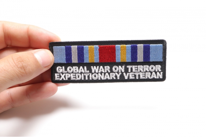 Global War On Terror Expeditionary Patch shown on hand for size comparison