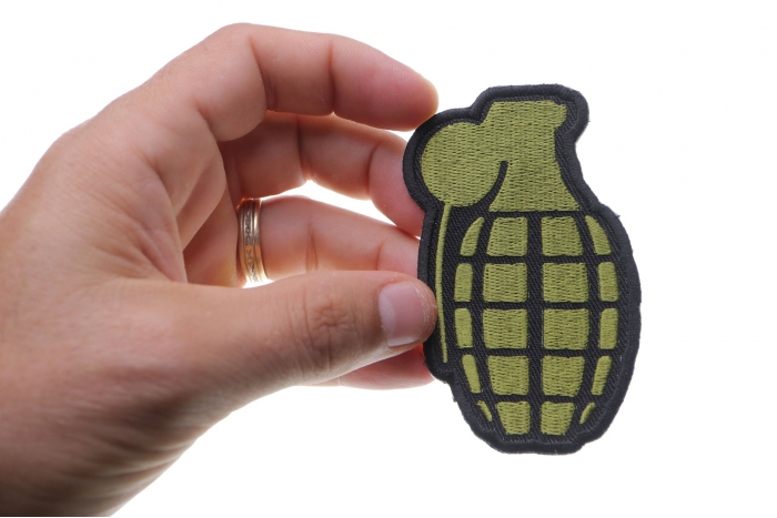 Grenade Iron on Patch In OD Green shown on hand for size comparison