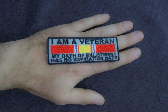 I Am A Veteran My Oath Of Enlistment Has No Expiration Date Patch, Military Vet Patches shown on hand for size comparison