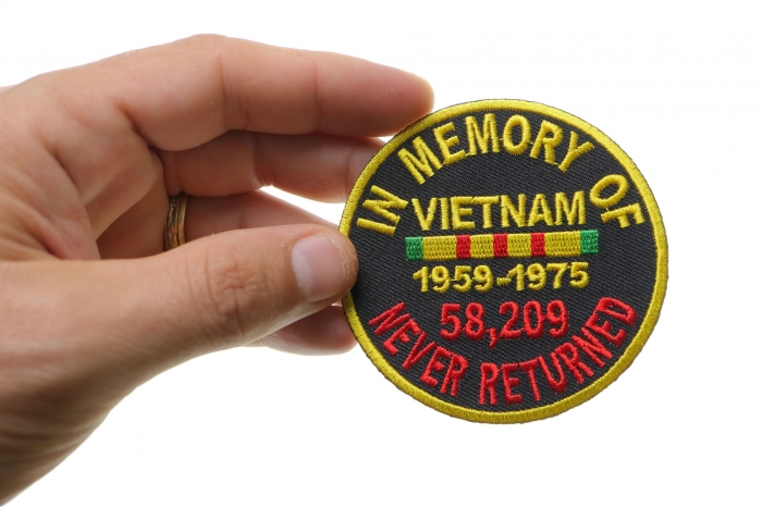 In Memory Of Vietnam Round Patch shown on hand for size comparison