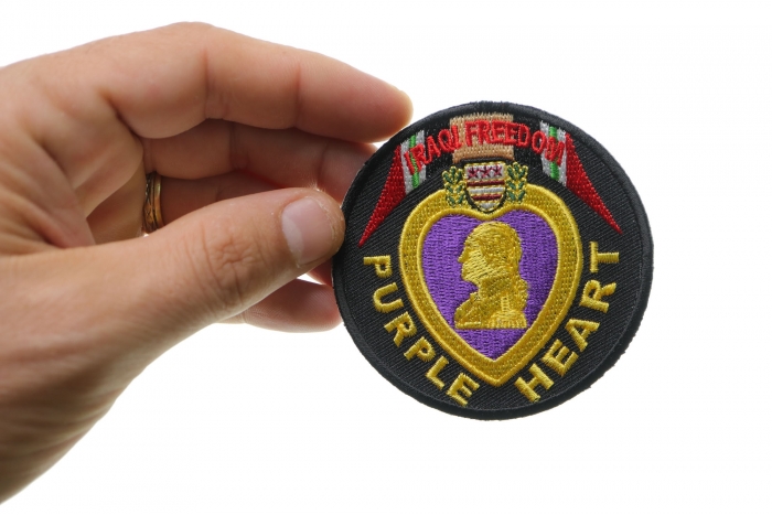 Iraqi Freedom Purple Heart Patch shown on hand for size comparison
