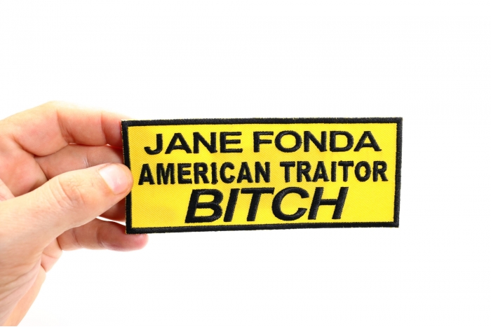 Jane Fonda American Traitor Bitch Patch, Patriotic Saying Patches shown on hand for size comparison