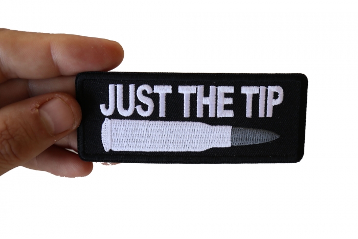 Just The Tip Bullet Patch, Funny Saying Patches shown on hand for size comparison