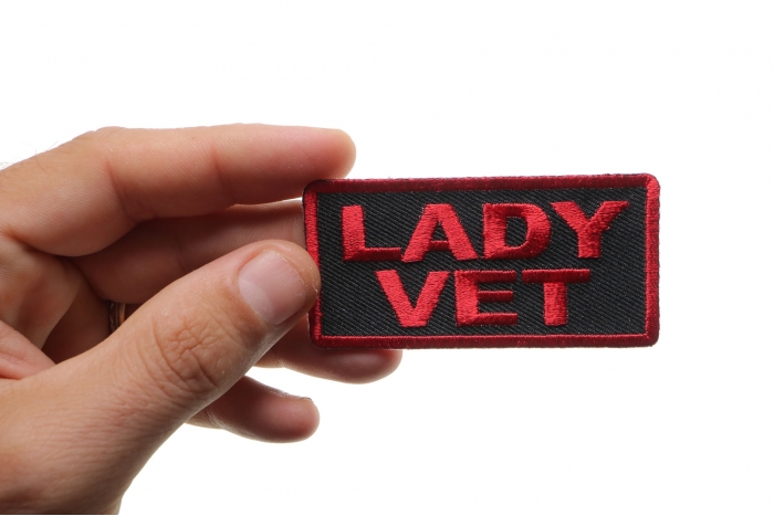 Lady Vet Patch shown on hand for size comparison