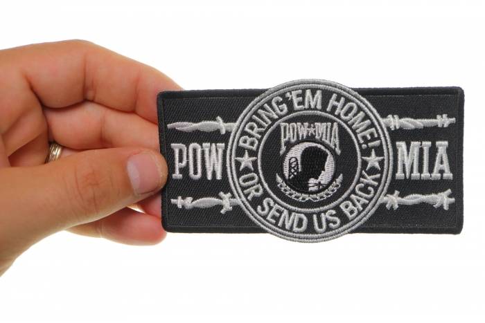 POW MIA Barbwire Patch shown on hand for size comparison