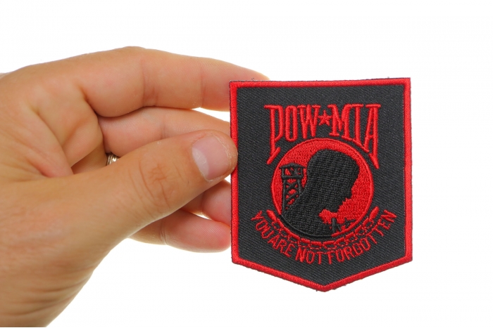 POW MIA Patch Black Red shown on hand for size comparison