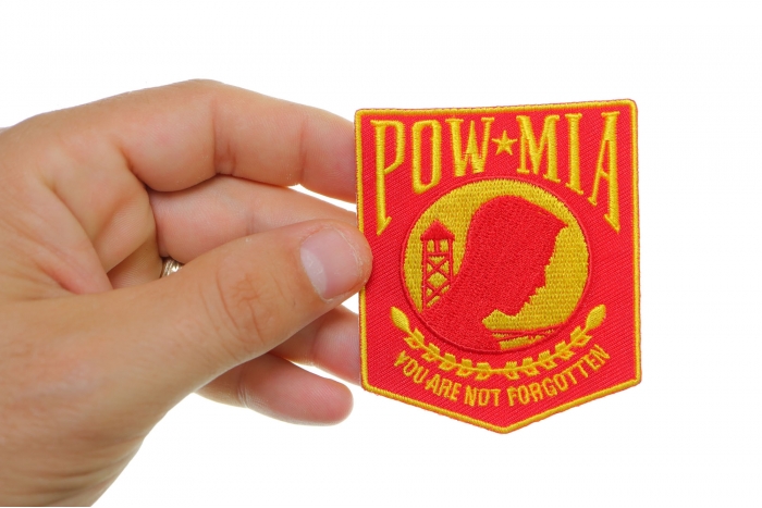 POW MIA Red and Yellow Patch shown on hand for size comparison