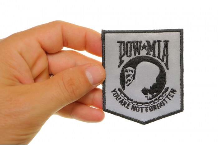 POW MIA Reflective Patch shown on hand for size comparison