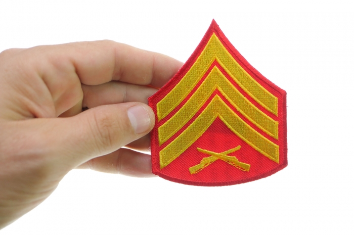 Sergeant Red Patch shown on hand for size comparison