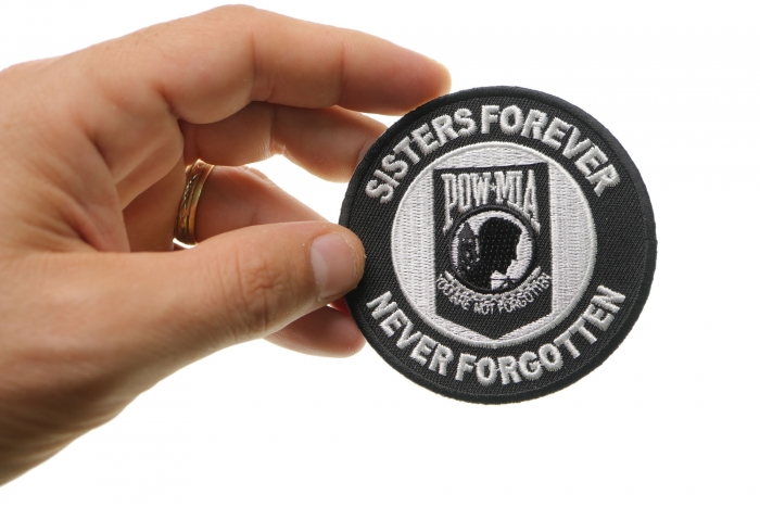 Sisters Forever POW MIA Iron on Patch shown on hand for size comparison