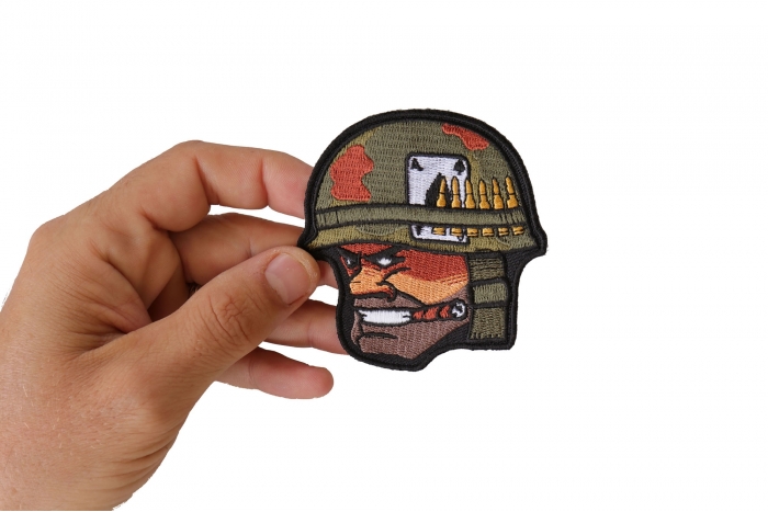 Soldier Cigar Ace of Spades Bullets and Helmet Patch shown on hand for size comparison