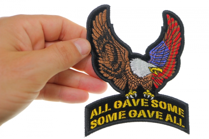 US POW MIA Upwing Eagle Rocker Small Patch shown on hand for size comparison